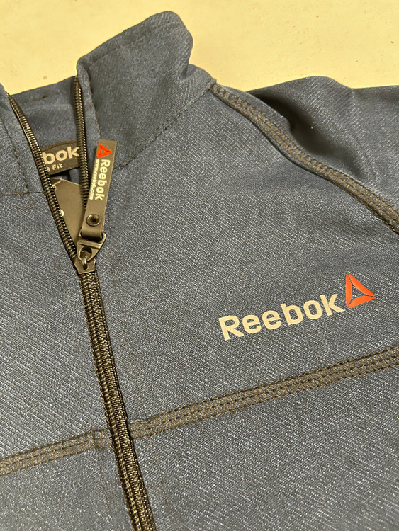 بلوز نیم زیپ آستین فینگردار وارداتی ریبوک